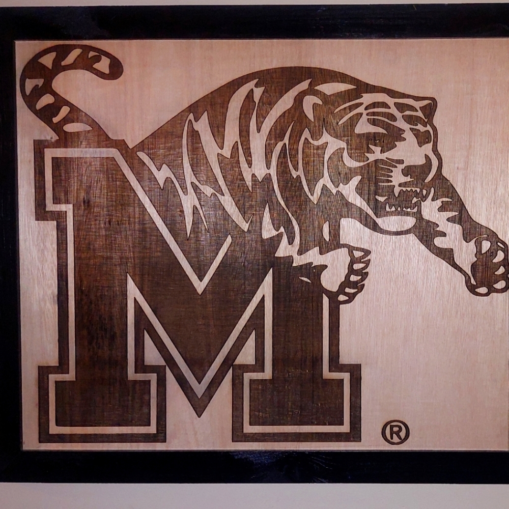 25"x20" laser engraved wood sports logo.